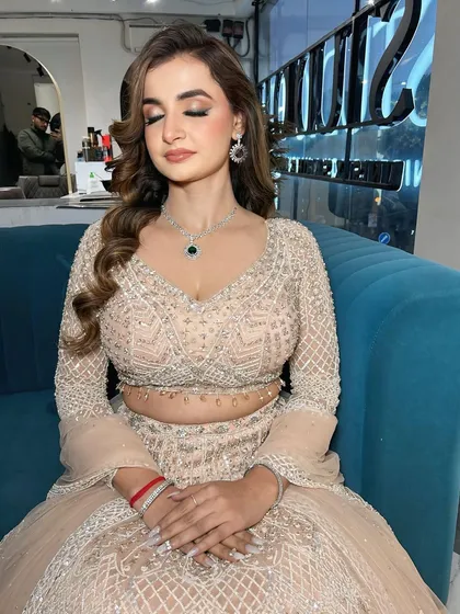 A close-up of the eye makeup for this engagement look. The soft shimmer and clean lines create an elegant and timeless feel.