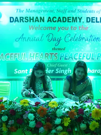 A well-organized registration and information desk is vital for any large event. This setup for the Darshan Academy's annual day ensured guests were welcomed and informed efficiently.