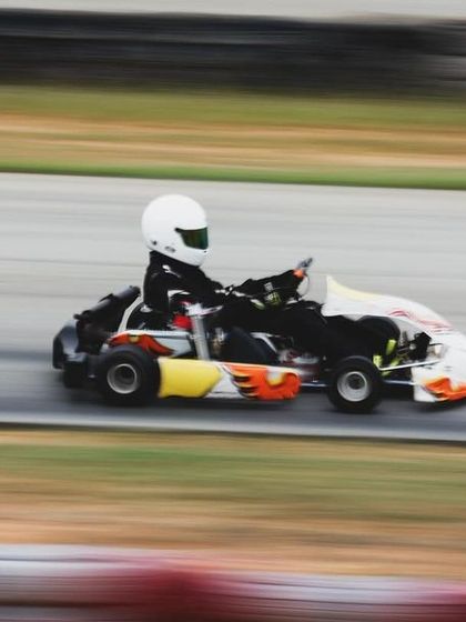 A high-speed panning shot showing the raw speed of our karts.