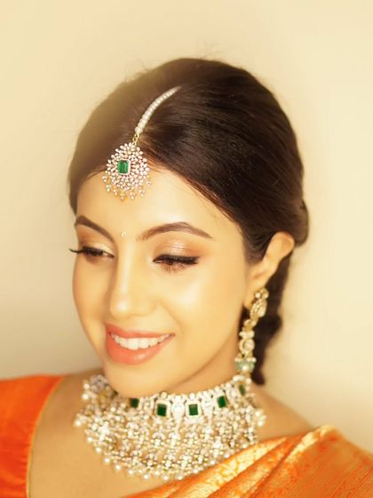 A bright, happy portrait of Priyanka at her baby shower. The makeup is fresh and luminous, a perfect celebration of this wonderful milestone.