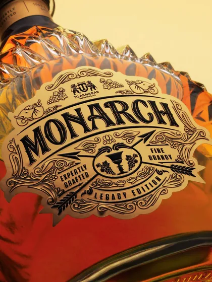 A macro shot of the Monarch brandy label. The detail on the "Legacy Edition" label is incredible, and this close-up highlights the expert craftsmanship of the packaging itself.