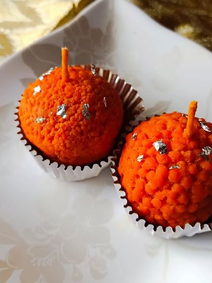 A pair of my detailed Motichoor Ladoo candles, ready for gifting. I use high-quality soy wax and essential oils, ensuring they not only look good but also provide a lovely aromatic experience when lit.
