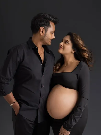 The look of love. This candid moment captures the beautiful chemistry between the expecting parents.