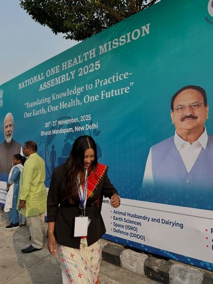 A candid moment outside the conference venue. Even in a formal setting, I find moments of joy and gratitude.