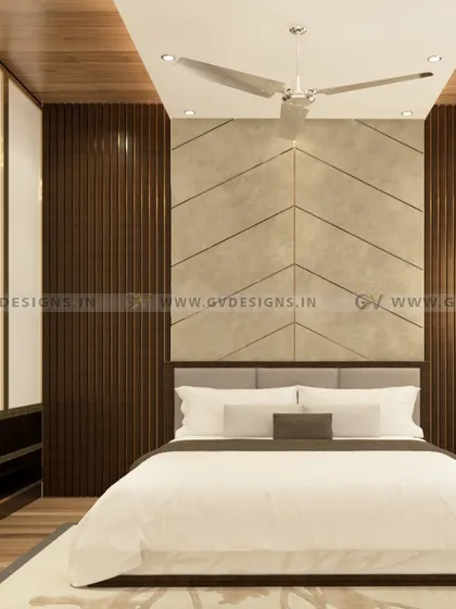 We craft master bedrooms that serve as personal sanctuaries. This design features a dramatic, floor-to-ceiling headboard, rich wood textures, and strategic ambient lighting to create a mood of sophisticated opulence and ultimate relaxation.
