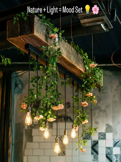 Our custom green chandeliers are functional art. This piece combines a rustic wooden beam, vintage Edison bulbs, and flowing artificial vines to bring warmth and a unique natural element to the ceiling.