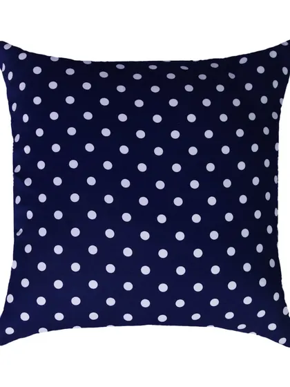 A navy blue and white polka dot square cushion, shot flat on a white background.