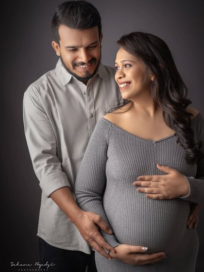 A slightly different angle capturing their joyful interaction. I love providing a variety of shots that show different facets of a couple's personality and connection.