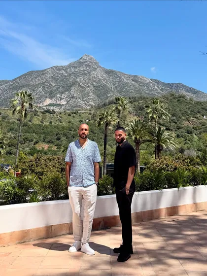 Posing with my DJ partner Arvee against the stunning mountain backdrop of Marbella. The scenery here is just insane.