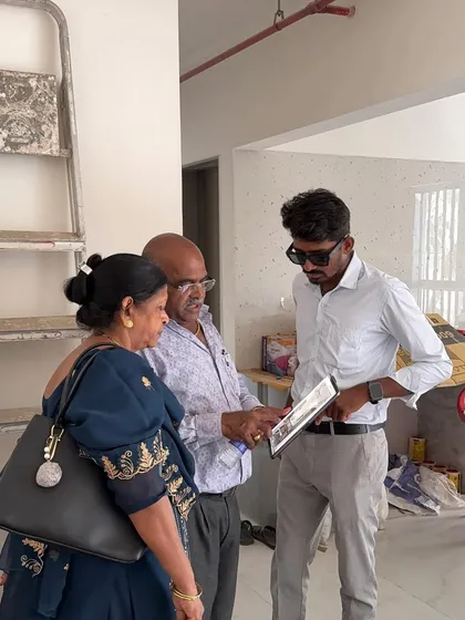 Showing the final designs to the clients on-site for one last confirmation before the finishing work begins.