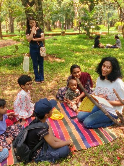 A fantastic series from our reading of 'Handa's Surprise'. My animated storytelling style is on full display, as are the delighted and curious faces of the children.