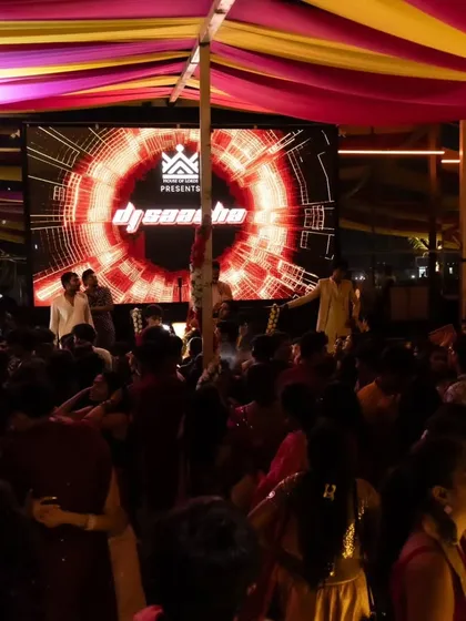 A packed dance floor is my promise. Here's a glimpse of a massive Sangeet night where the energy was electric from start to finish, complete with custom LED visuals.