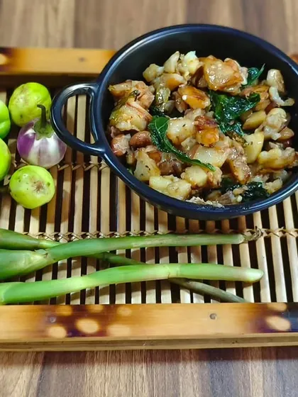 A dish prepared with Naga bitter gourd and other organic ingredients. These small, flavourful vegetables are a key part of our traditional diet.