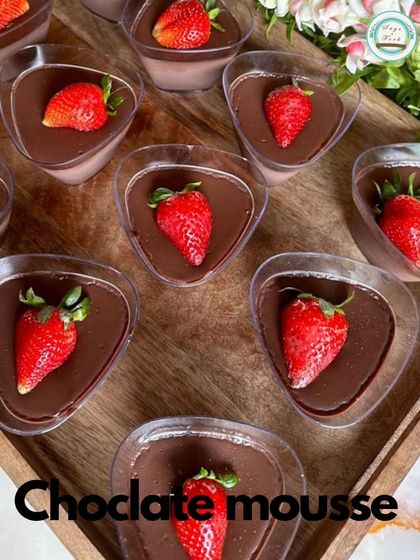 Dive into the silky smoothness of our rich Chocolate Mousse. This decadent treat, topped with a fresh strawberry, melts in your mouth with every spoonful.