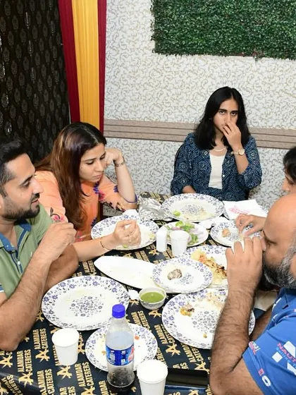 A group of friends enjoying their dinner. We hope you had a great time.