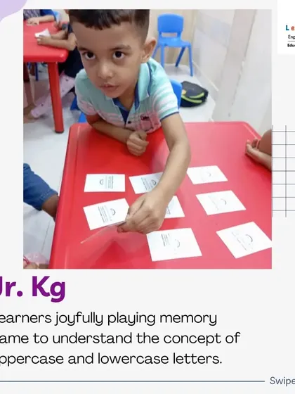Look at the focus on this student's face! He is deeply engaged in our letter memory game. This kind of hands-on activity is crucial for helping young children grasp foundational concepts like uppercase and lowercase letters.