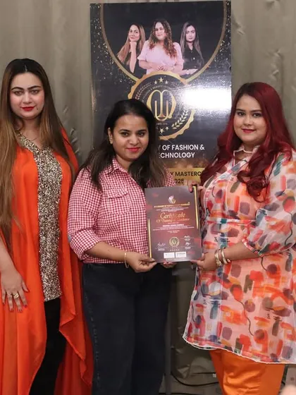 Another one of my talented students receiving her certificate. I ensure every graduate leaves with a government-recognized certification that is valuable for getting jobs and clients.