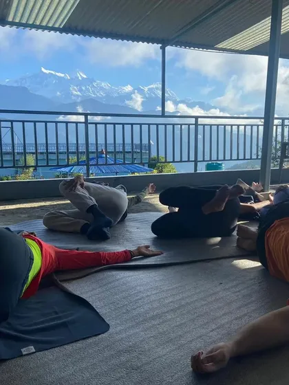 An outdoor shala with a view of the Himalayas. During our Nepal retreat, we start our mornings with asana and pranayama, with the mountains as our witness. All levels are welcome to join and deepen their practice.