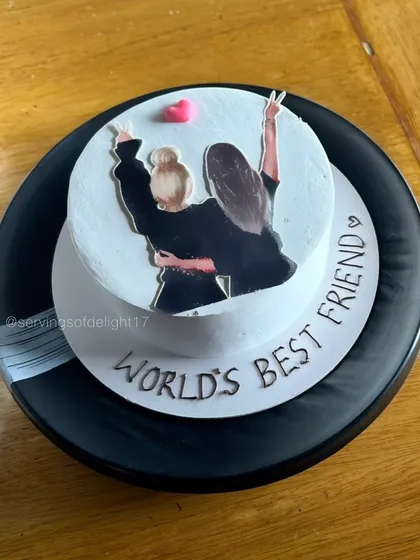 A custom illustration on a mini cake for the "World's Best Friend." I love turning your photos and ideas into edible art.