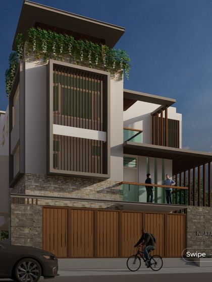 Another render of the Srinidhi Residence, showcasing its modern facade with a mix of stone cladding, wood, and large glass windows. The design incorporates multiple balconies and a green roof.