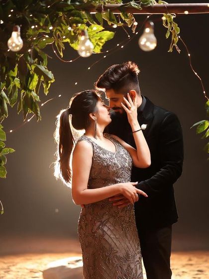 A magical, fairytale moment created with string lights and floral arrangements. This setup is perfect for an evening shoot, adding a warm, romantic glow and creating an enchanting atmosphere for your photos.