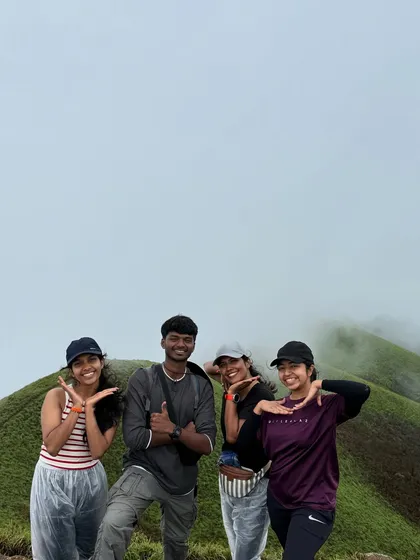 Friends posing together on the Netravathi trail, capturing a fun moment from their trek.