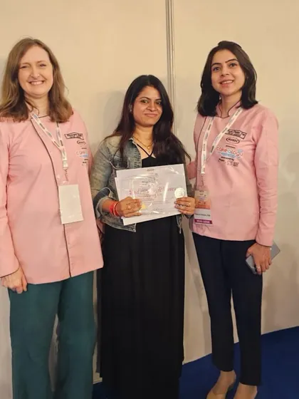 Receiving my certificate from the judges. A moment of pure joy and gratitude.