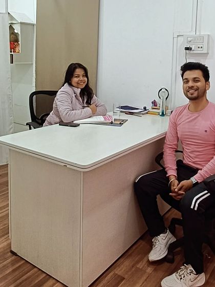 A client during his consultation at my clinic. I believe in understanding each person's unique skin and hair concerns before recommending any treatment.