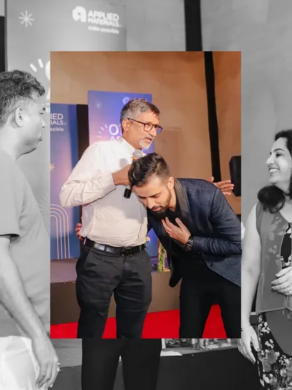A moment of respect and gratitude, receiving blessings from a senior employee at Applied Materials.