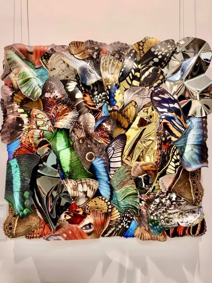 A full shot of the earth-toned butterfly wall sculpture, a celebration of natural color and form.