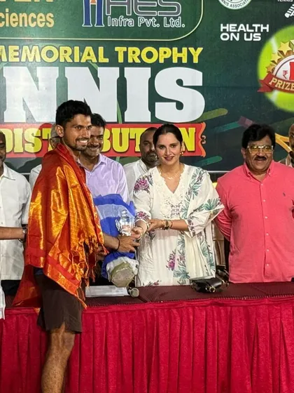 A moment of recognition for our player, receiving the runners-up award from tennis icon Sania Mirza at the AITA 5 Lacs tournament in Hyderabad.