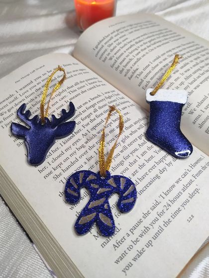 Another set of my blue Christmas ornaments, featuring a reindeer, candy cane, and stocking. They are lightweight and perfect for any Christmas tree.