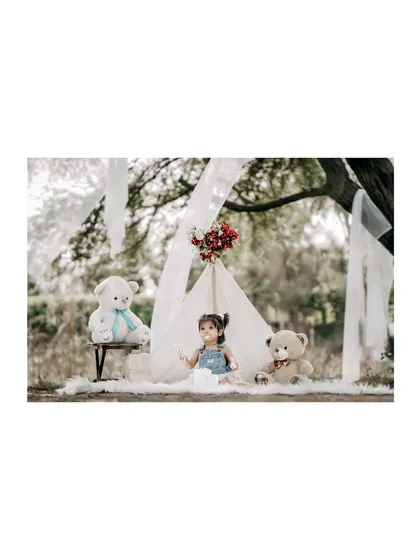 A perfect little camper in her outdoor tent. This setup is one of my favorites for creating a sense of adventure and wonder for little explorers.