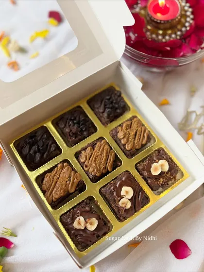 My 'Brownie Bites Box' for Diwali, featuring an assortment of Chocochip, Nutella, and Lotus Biscoff flavors in bite-sized pieces.