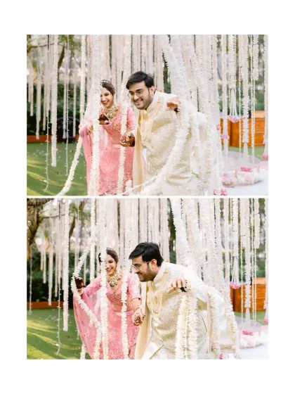 A playful moment during the varmala ceremony, where the couple shares a laugh and a fun pose, showcasing their joyful personalities.