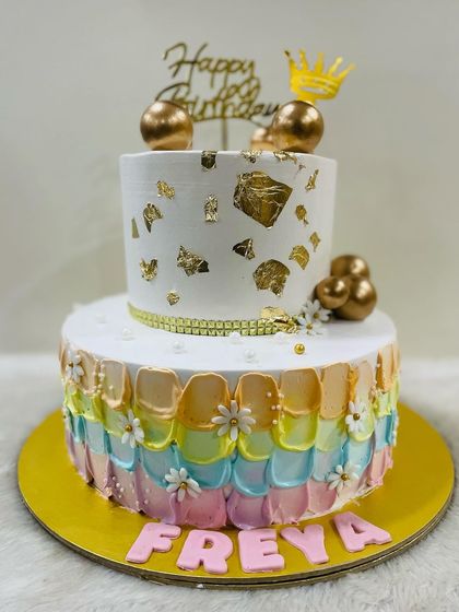 Another view of the lovely pastel rainbow petal cake, showing the delicate texture and colors.