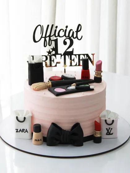 A classic theme that never goes out of style: a makeup and shopping cake for a 12-year-old pre-teen, featuring edible lipsticks, makeup palettes, and designer shopping bags.