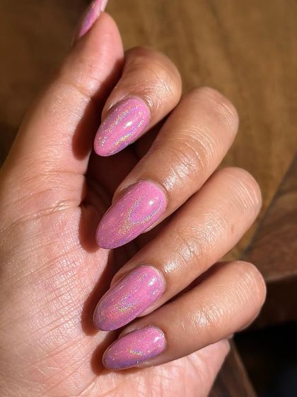 Another look at the shimmery pink aurora nails. The effect is so mesmerizing and fun.