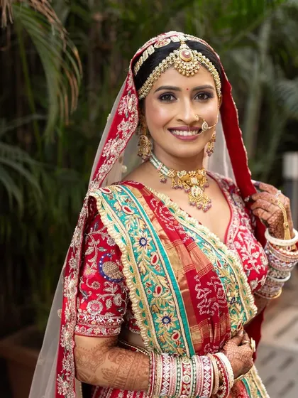 A happy, glowing bride. Her smile is the best accessory to this traditional look with a modern soft glam touch.