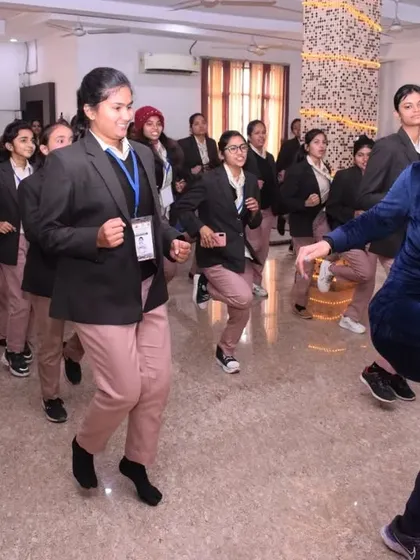 Leading a fun dance fitness routine with the students. They loved it.