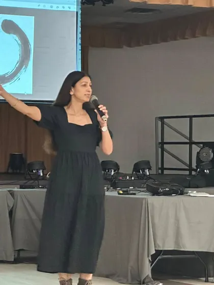 Speaking to a group about the power of embracing your whole self, including the quiet, introverted parts. I often share my own journey with being an introvert to help others feel seen and to challenge the idea that confidence is only measured by how loudly you speak.