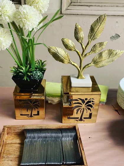 My team carefully arranges cutlery and decor to create a polished and professional look. Every detail, from the plates to the flower arrangements, is thoughtfully placed.