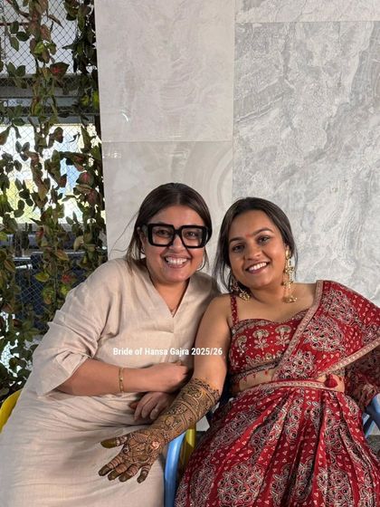 A happy moment with my bride. Her smile and the trust she placed in me to create her portrait mehendi are the reasons I love what I do.