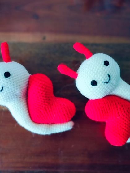 A special gift for your valentine. This is a cute snail with a red heart for its shell.