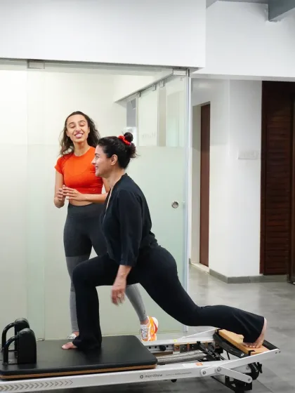 A smile during a tough workout is a sign of a great session. Our founder Namrata Purohit guides Kajol through a reformer exercise, ensuring perfect form while keeping the atmosphere positive and motivating.