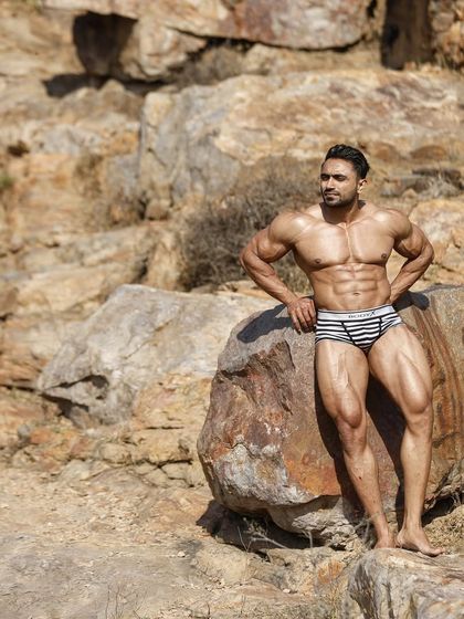 Photoshoot. Posing in a natural, rocky environment.