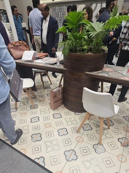 Our "Fall Collection" of designer floor tiles on display. This showcases the kind of unique, patterned flooring we bring to the market, perfect for cafes, boutiques, or stylish homes.