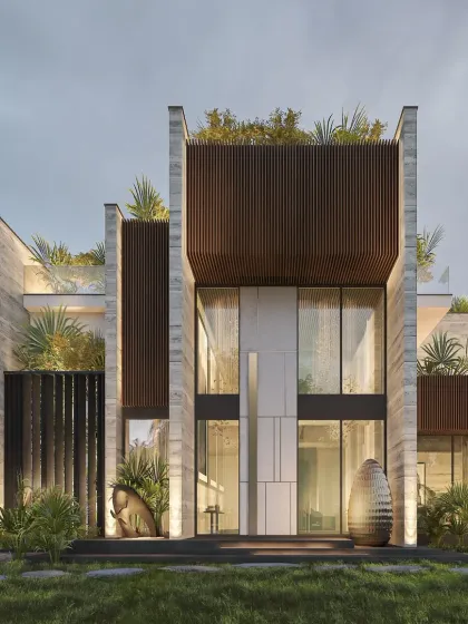A frontal view of the South City 1 residence, where structure, texture, and nature come together. The design integrates green terraces and landscaped corners to bring the facade to life and create an urban oasis.