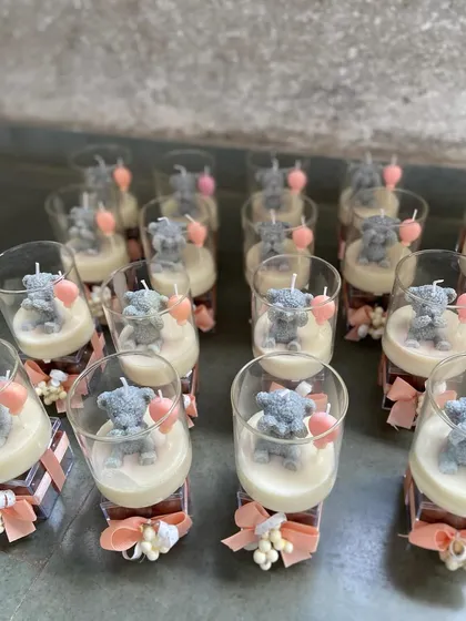 Adorable teddy bear candles, perfect as return favors for a baby shower or birth announcement. We can create these in bulk, each one a tiny, sweet-smelling token of gratitude for your guests.