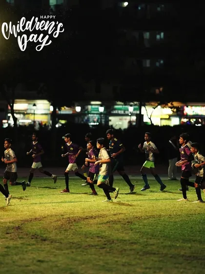 Our young players running together during a warm-up. We celebrate the energy and dreams they bring to the pitch every single day.